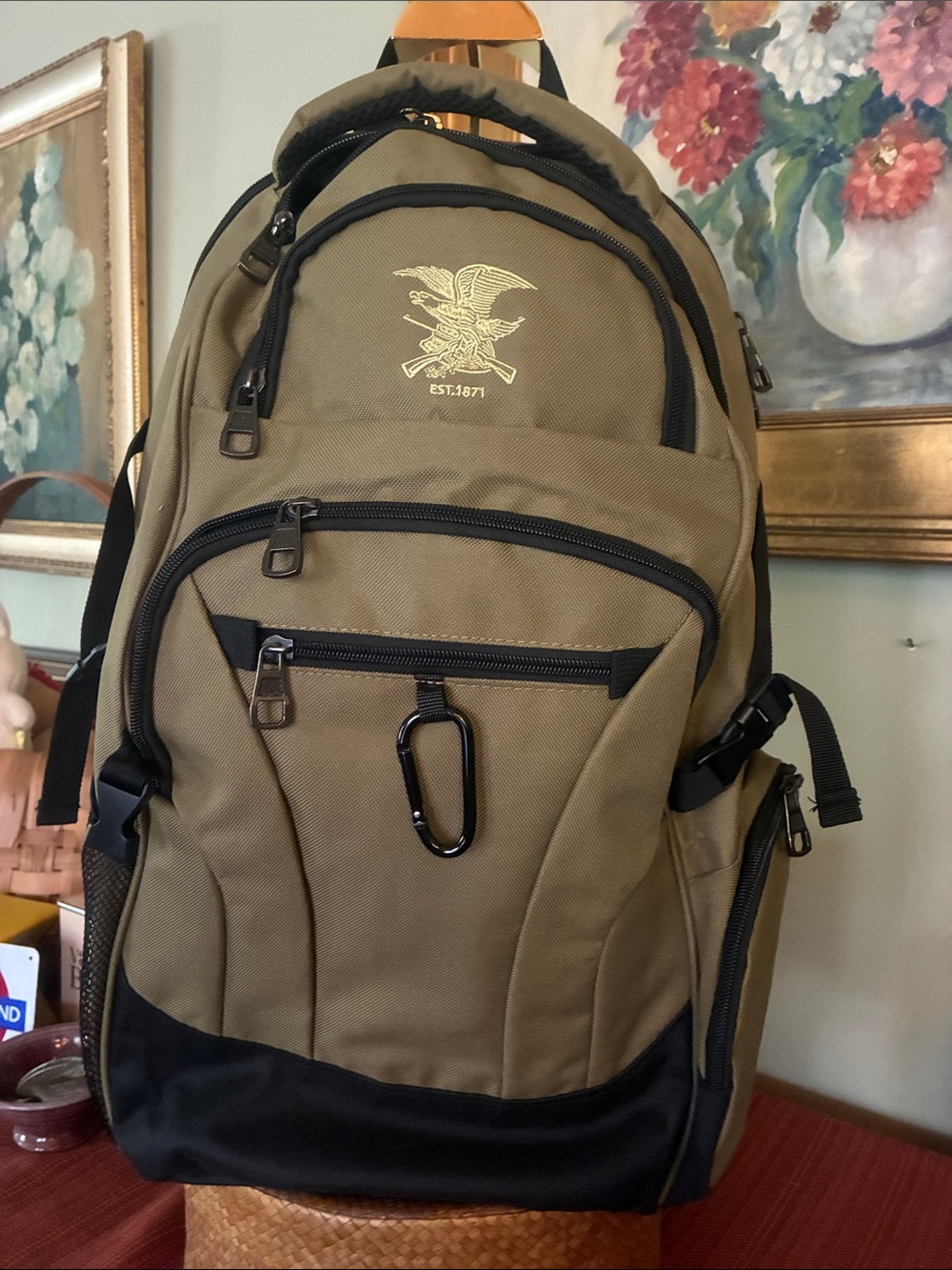 NRA Tactical Backpack Multi-Pocket in tan with black accent panels, EST 1871